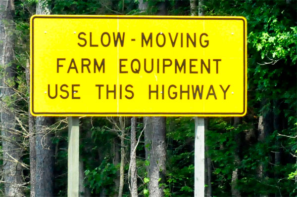slow moving farm equipment sign